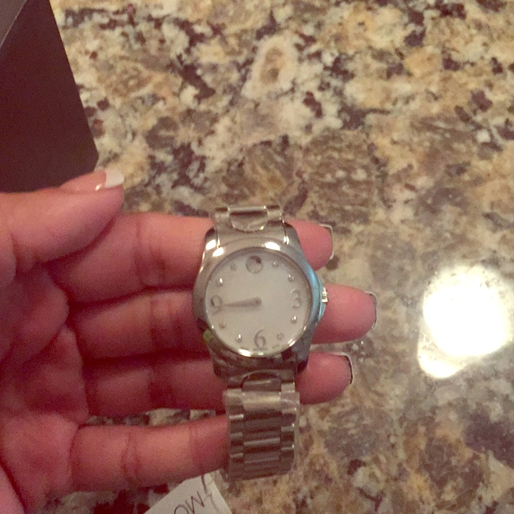 Movado Diamond Mother of Pearl watch with tags.